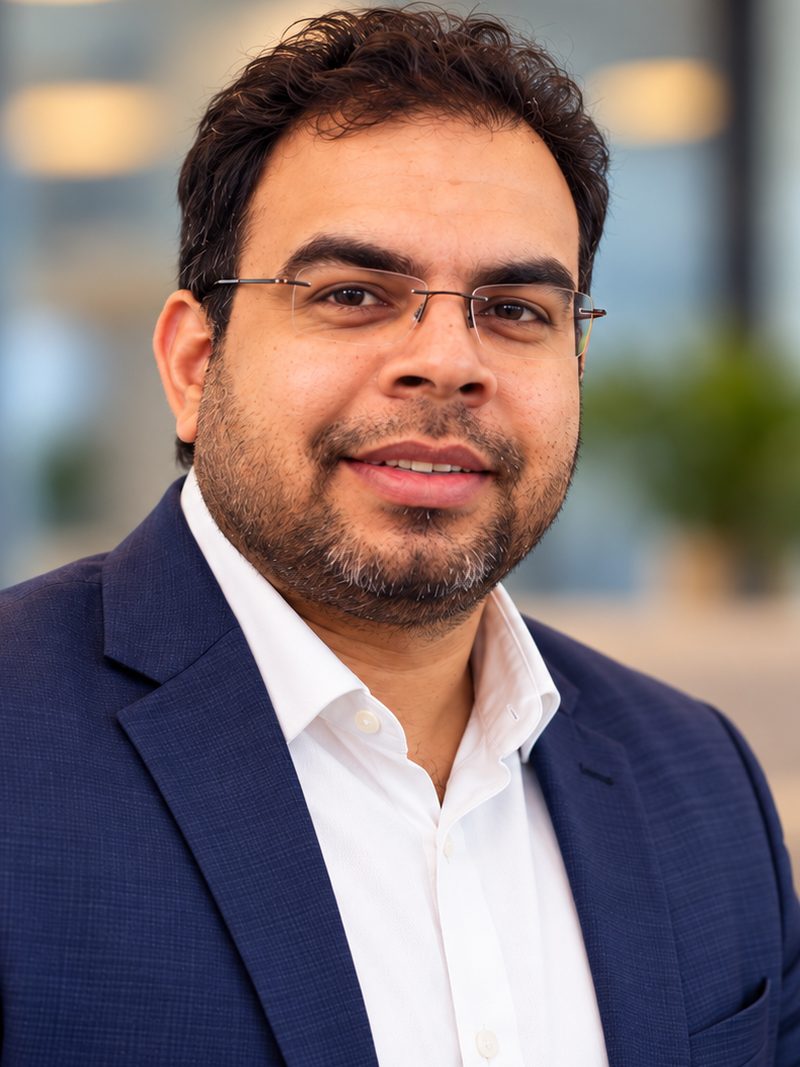 Portrait of Kapil Bhola, technical lead and solution consultant.